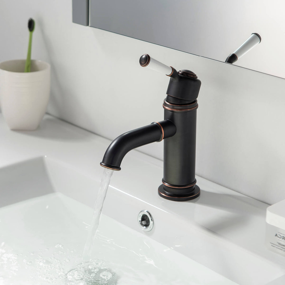 Aquavit Victoria oil-rubbed bronze basin faucet in bathroom setting
