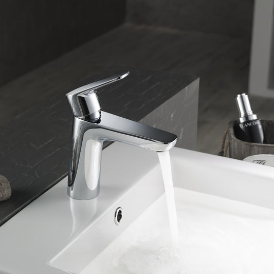 Aquavit Harmony chrome basin faucet installed on a dark bathroom vanity