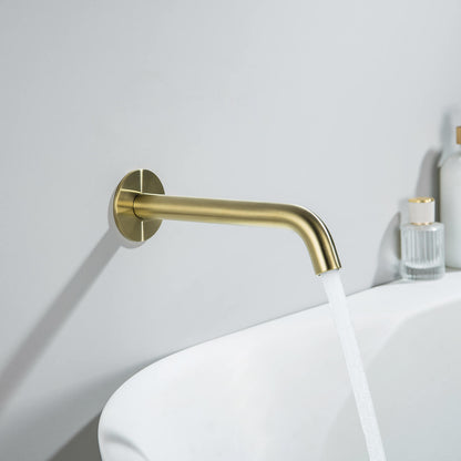 Aquavit Circular brushed gold wall-mounted bath spout delivering water into a bathtub