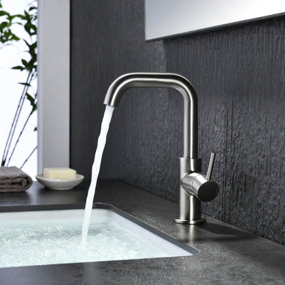 Aquavit Circular brushed nickel basin faucet AT090711 on black countertop