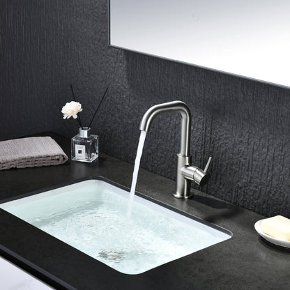 Aquavit Circular brushed nickel basin faucet AT090711 in dark bathroom setting