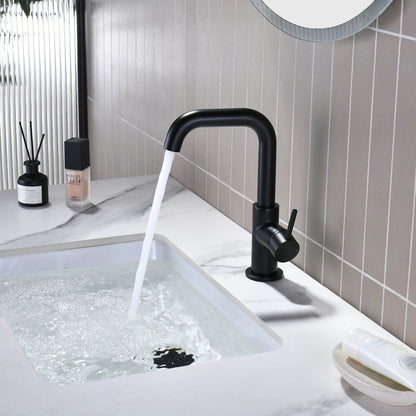 Aquavit Circular matte black basin faucet AT090711 installed with running water