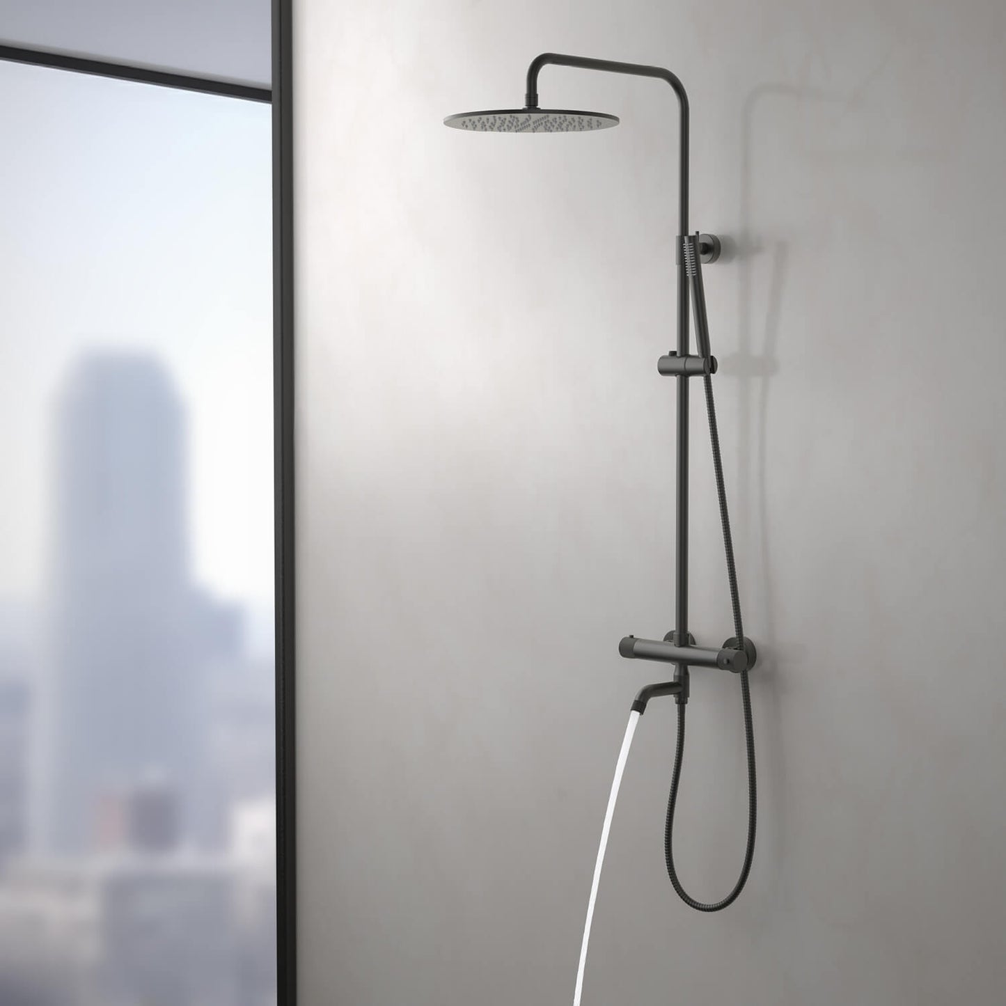 Aquavit AT107301 brushed gunmetal shower column with swivel brass bath spout in use