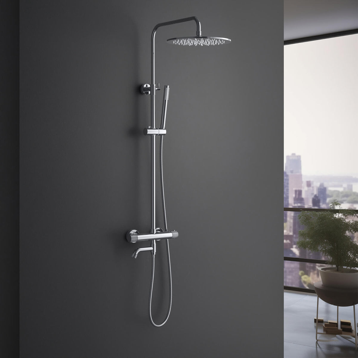 Aquavit Circular X chrome thermostatic shower column installed against a dark bathroom wall