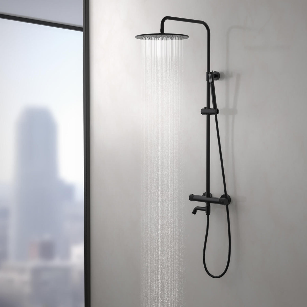 Aquavit AT107301 matte black thermostatic shower column with overhead shower running in a modern bathroom