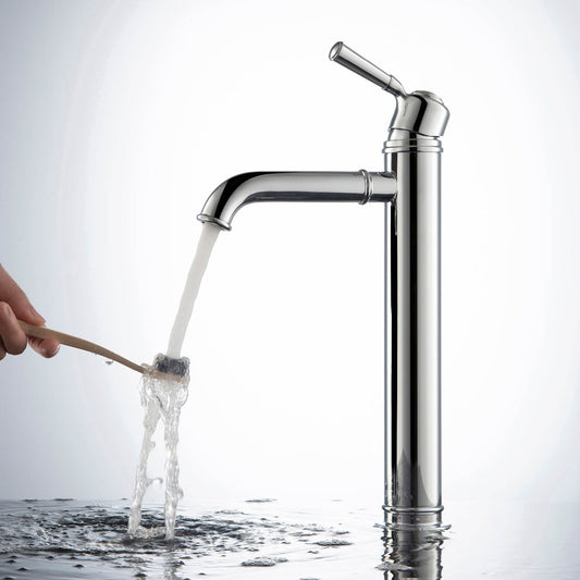 Aquavit Victoria chrome vessel sink faucet with running water over a hand