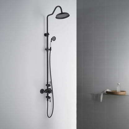 Aquavit Victoria matte black shower column installed against light bathroom wall