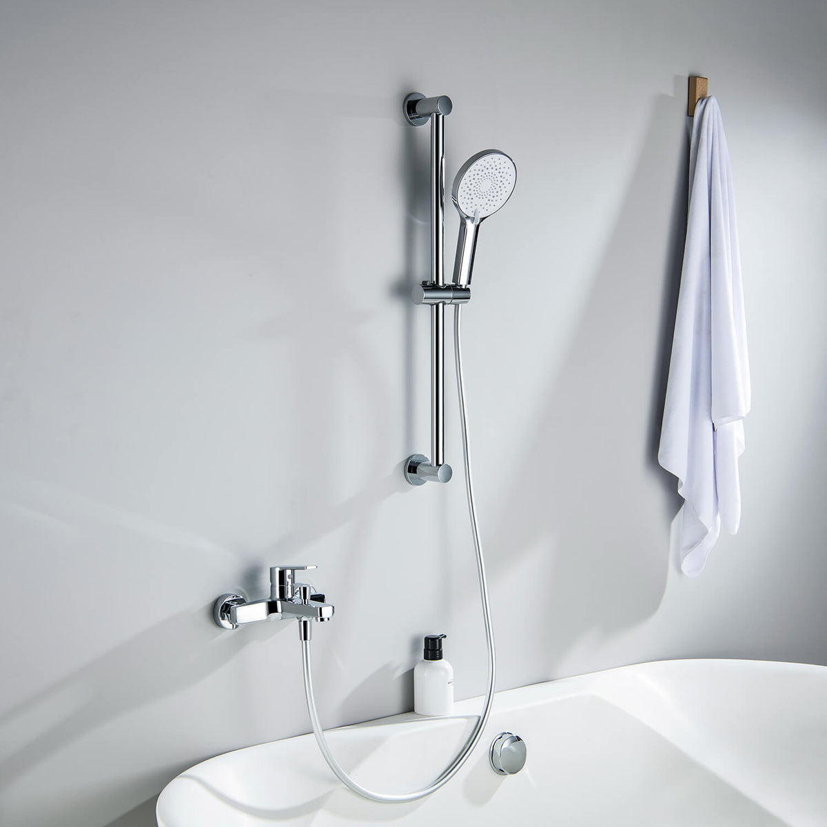 Aquavit Sense chrome bath shower mixer set installed beside a bathtub