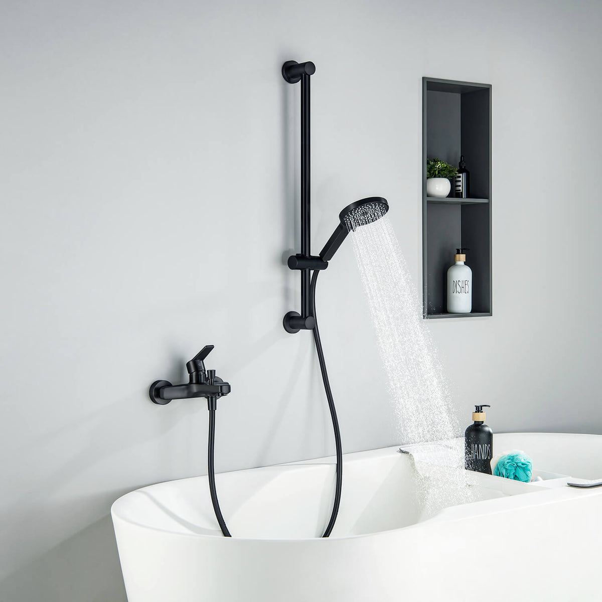 Aquavit Sense Matte Black bath shower mixer set installed beside a bathtub